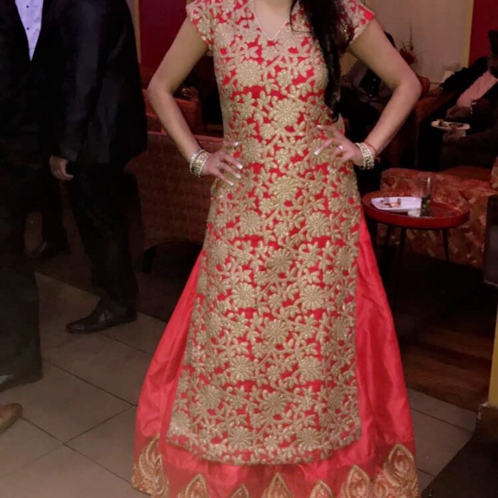 Beautiful red lengha with long kurta. No dupatta